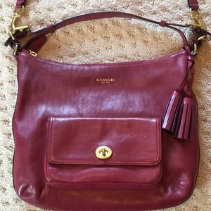 Gently used  convertible coach bag with dust cover